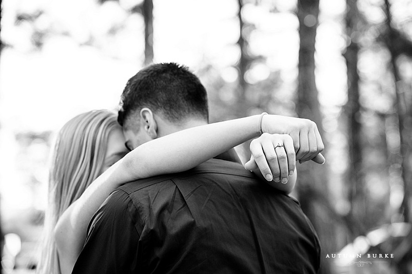black and white engagement portrait, close up of wedding rings, hands 